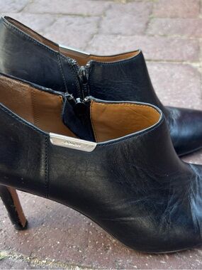 Coach Black Leather Pointed Toe Ankle Booties with Silver Accent